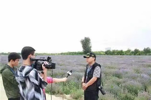 深耕廿载守初心 以文载景传中国——记《香港每日电讯》总编辑雪峰(图2) 深耕廿载守初心 以文载景传中国——记《香港每日电讯》总编辑雪峰(图2)